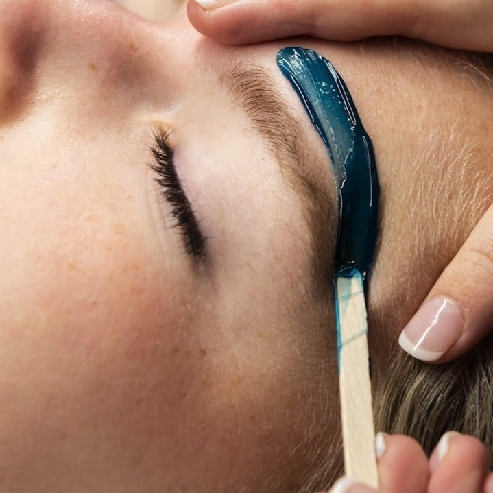 Professional brow waxing treatment at Anasa Beauty